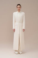 Structured wool-blend longline coat with tailored collar, slit hem and flap pocket detail